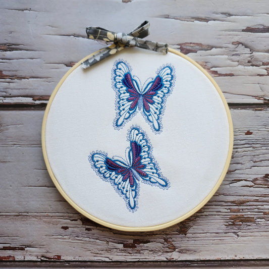 Hoop embroidered butterflies